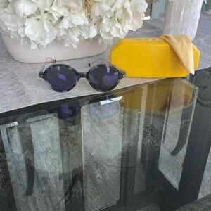 Christian Dior Sunnies!  Fun purple design on the front w/ tortoise frames 😎